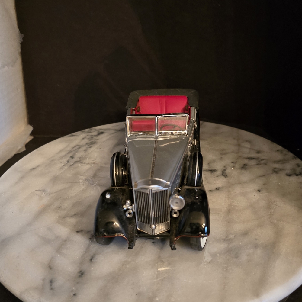 Vintage Black and Silver Toy Car with Red Interior